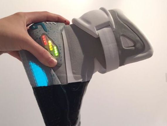 Someone Dipped Nike Air Mags and adidas Yeezy Boosts In Black Paint