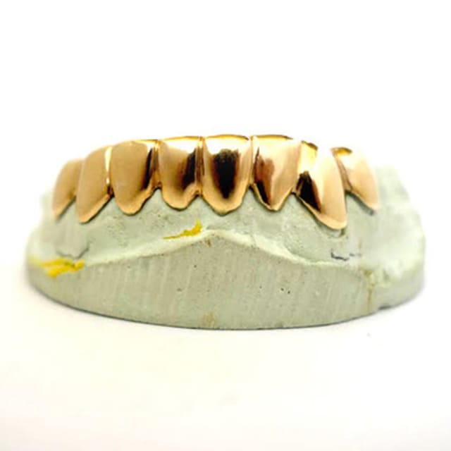 How Grills Are Made, According to The Gold Teeth God Complex