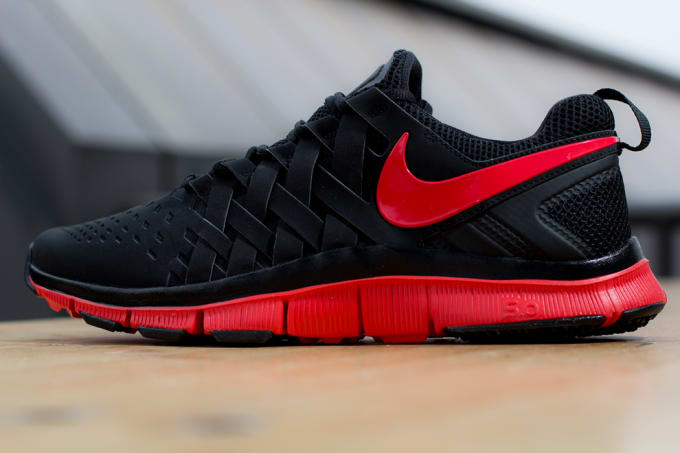 red and white nike free trainer 5.0