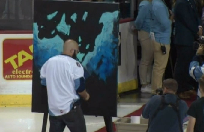 Watch This Guy Paint an Upside Down Portrait as He Sings the National Anthem