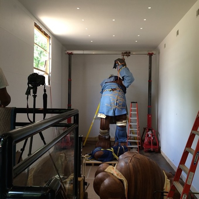 Swizz Beatz Installs 19FootTall KAWS Sculpture in Home