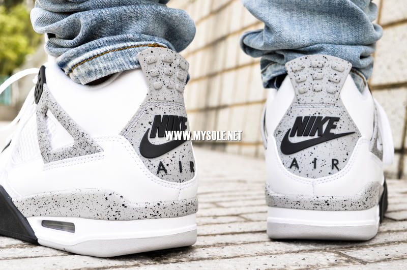 jordan 4 white cement on feet