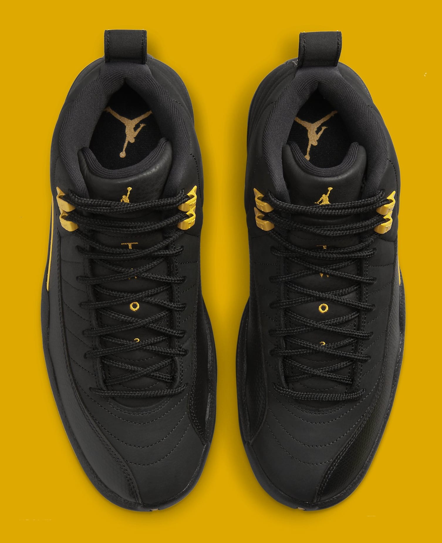 Black jordan 12s release date best sale