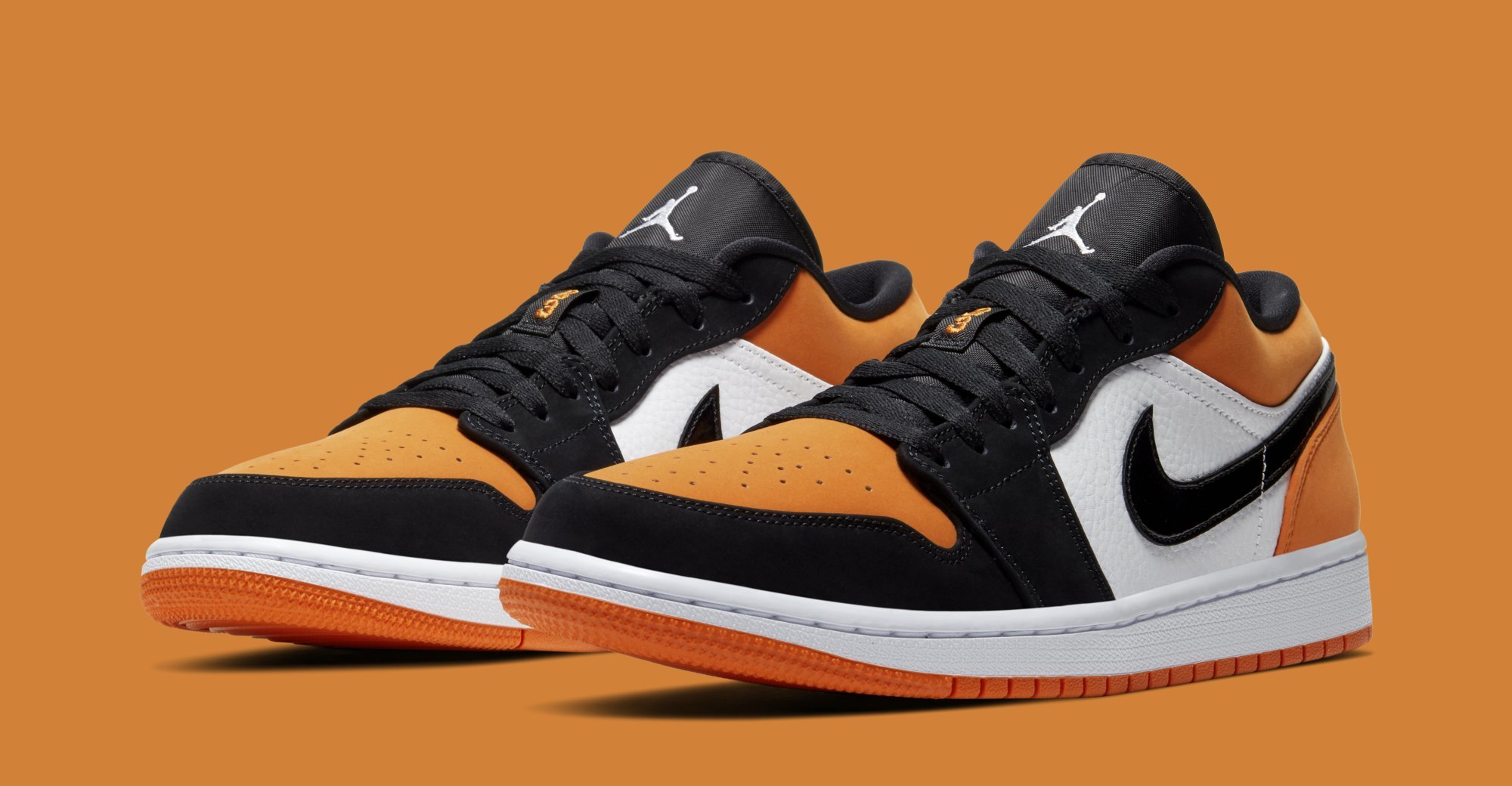 Black and orange jordan 1 low best sale