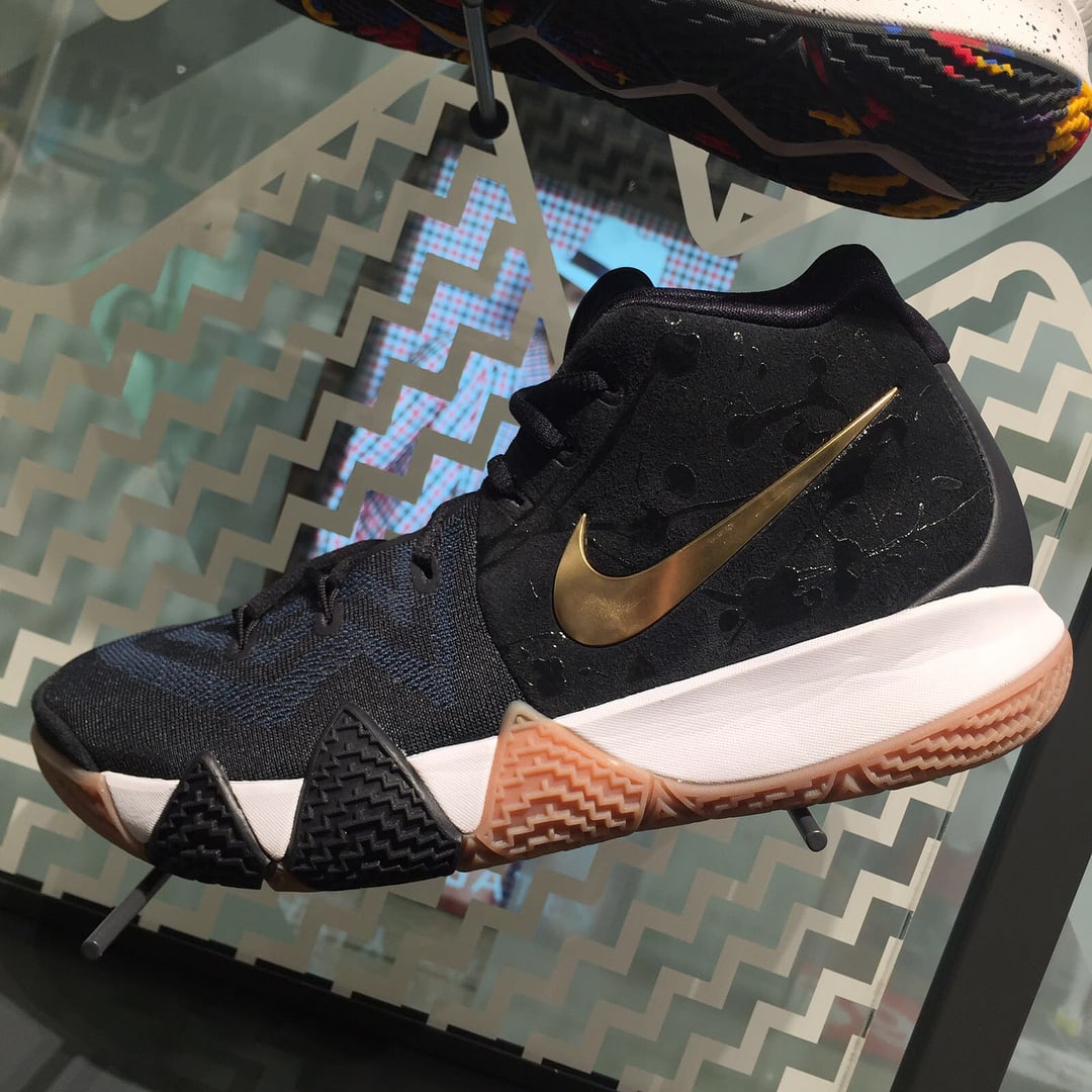 Nike kyrie 4 black and gold best sale