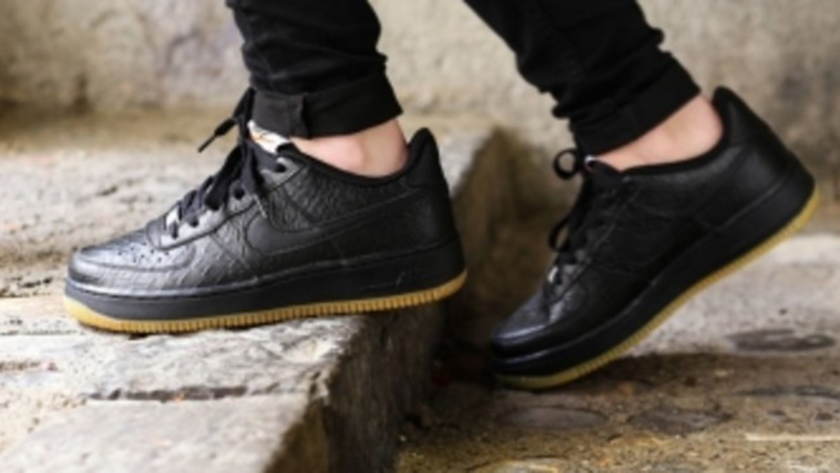 Black air force ones on feet best sale