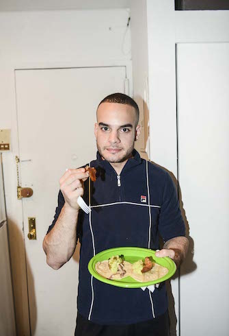 Chef Phillip Basone hosts dinner for friends at his home in New York, November 2016.