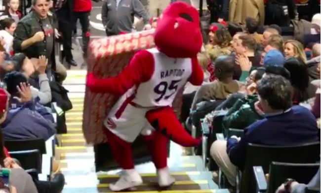 Toronto Raptors Mascot Breaks Flatscreen TV While Bringing It To a Fan Who Won It