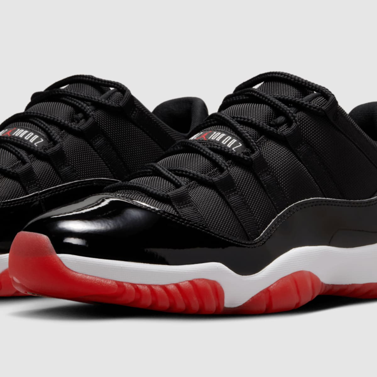 Bred' Air Jordan 11 Low Releases This Month