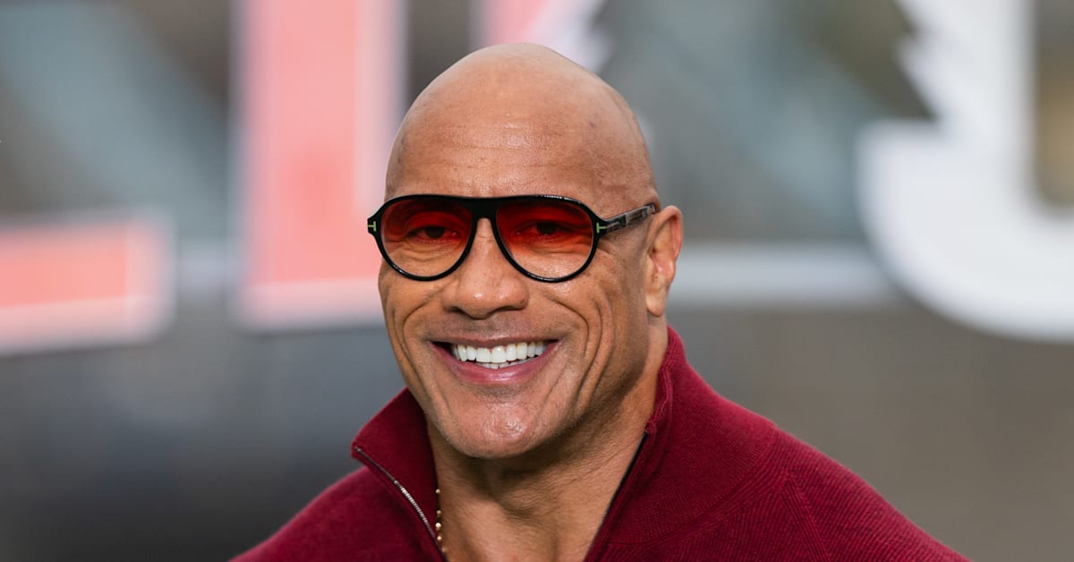Watch Dwayne 'The Rock' Johnson Calm Emotional Fan, Hug and Take Selfie
