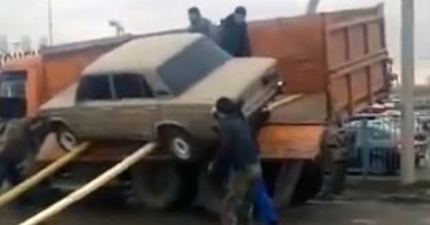 A Hilariously Stupid Attempt at Unloading a Car (Video)