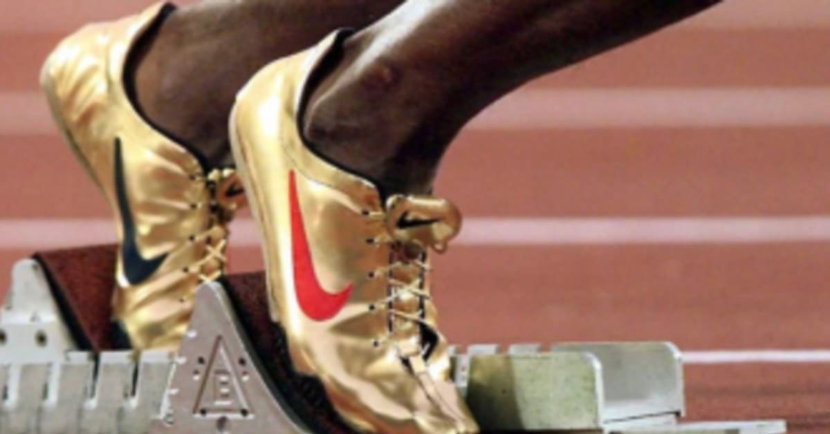 Gold nike track spikes clearance