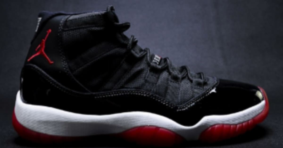 Black jordans with red bottoms online