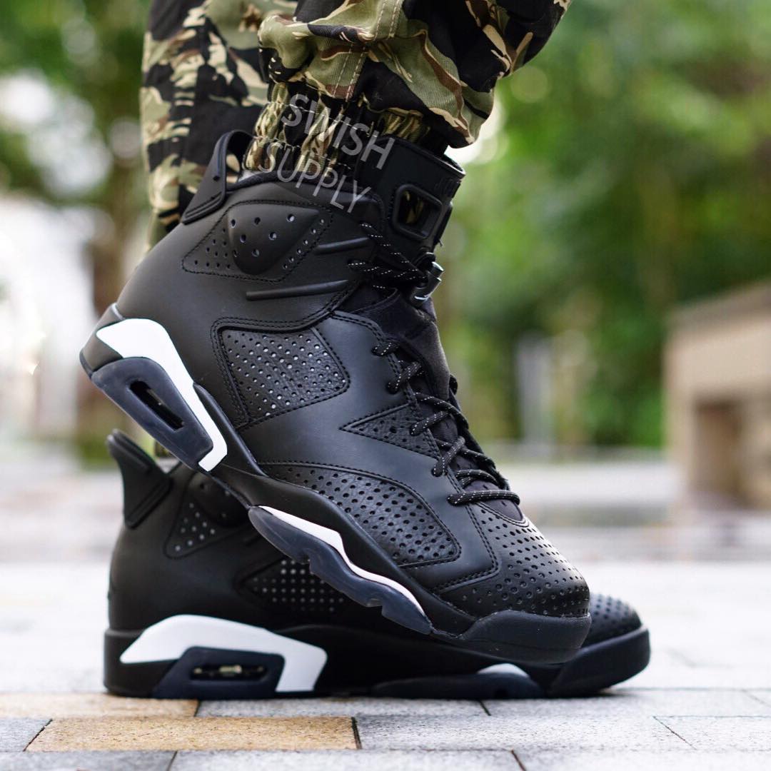 black cat 6s on feet