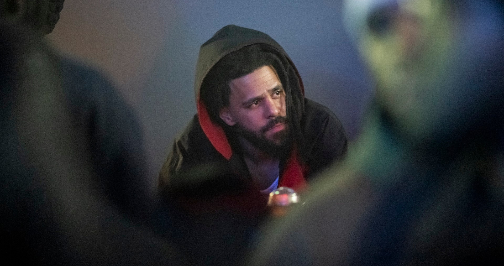 J. Cole Tells Fan He Won't Sign His Baby — But Then He Does