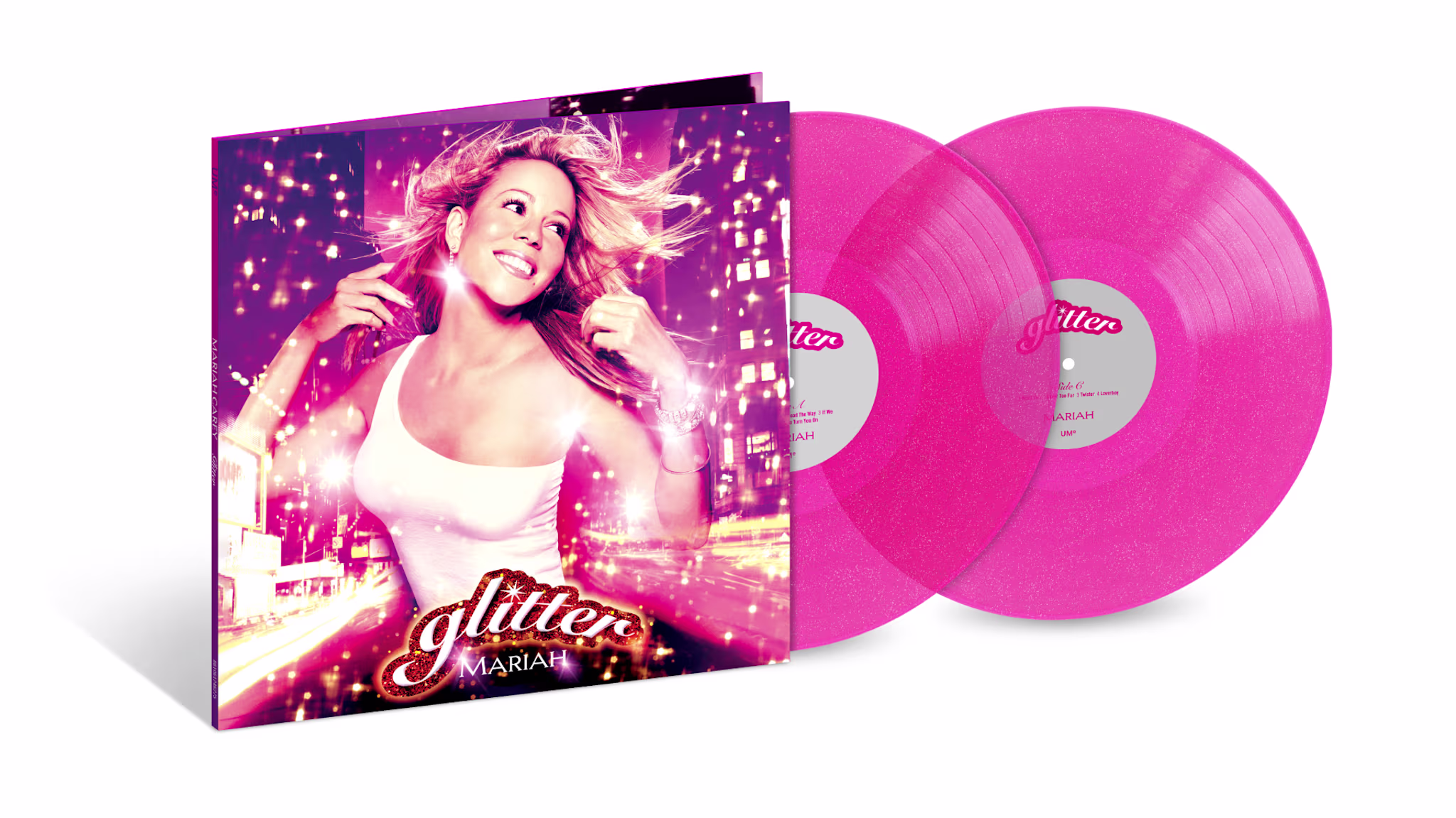Album cover of "Glitter" by Mariah Carey featuring her smiling with flowing hair, alongside two pink vinyl records.