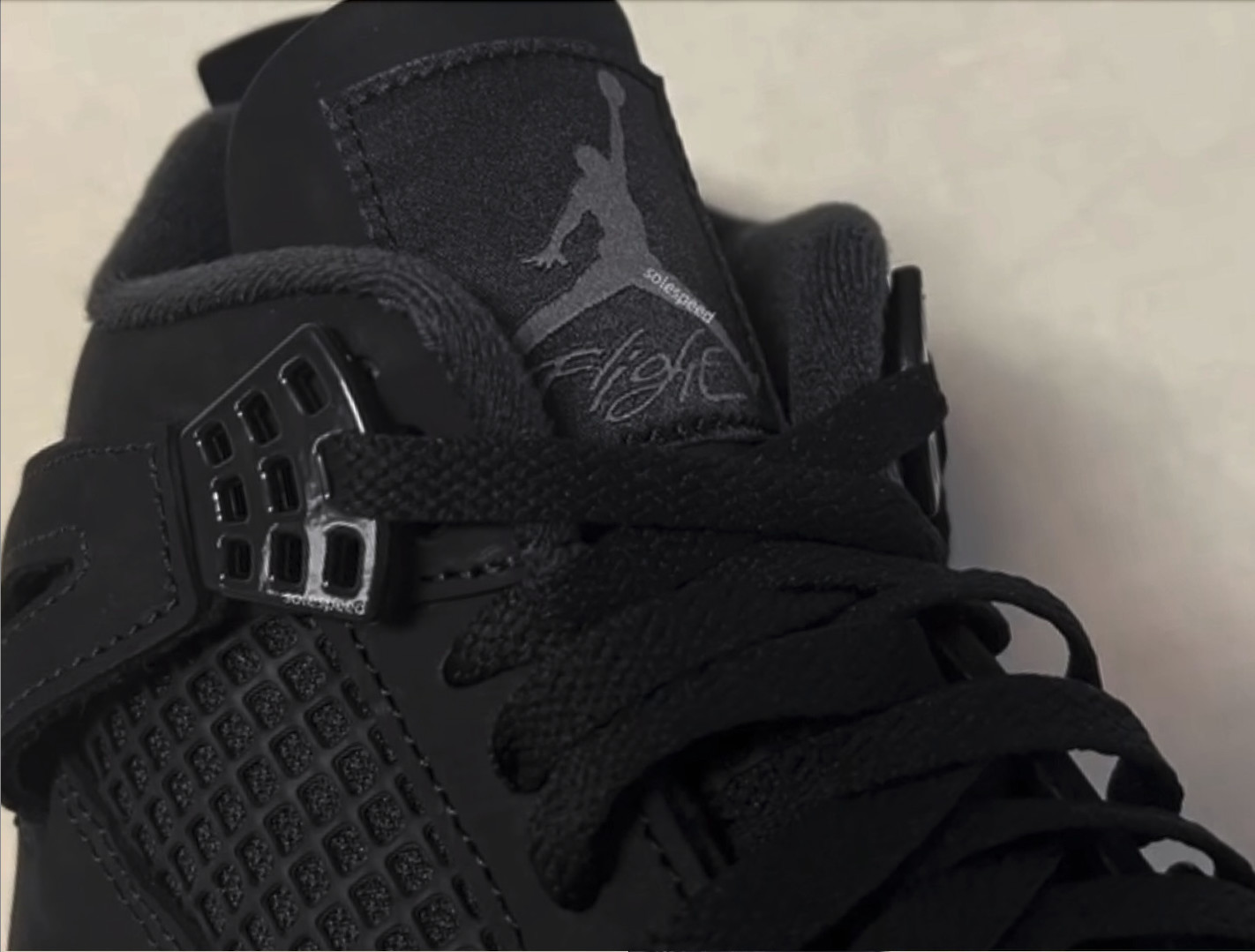 First Look at the 2025 'Black Cat' Air Jordan 4 With 'Nike Air' Branding