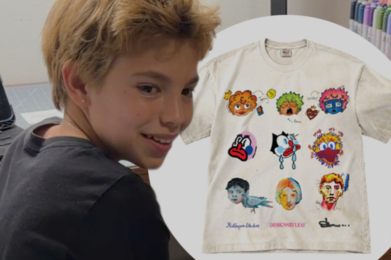 A person with short hair sits at a desk, smiling. Nearby, a T-shirt displays colorful, artistic faces and designs.