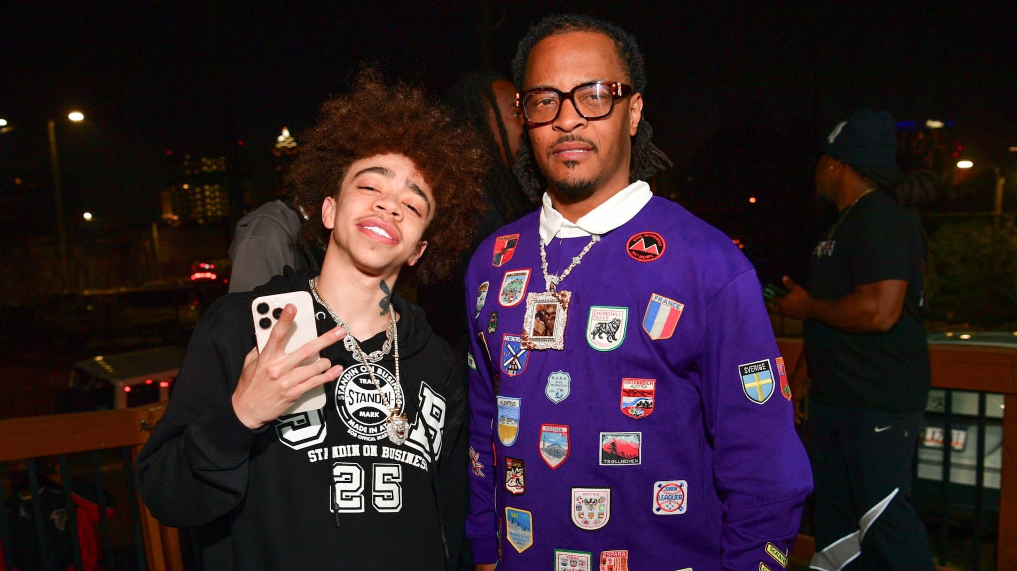 ATLANTA, GEORGIA - MARCH 27: King Harris and T.I. attend OMG Girlz "Make A Scene" Single Release & Video Viewing Party at Trap City Cafe on March 27, 2025 in Atlanta, Georgia.