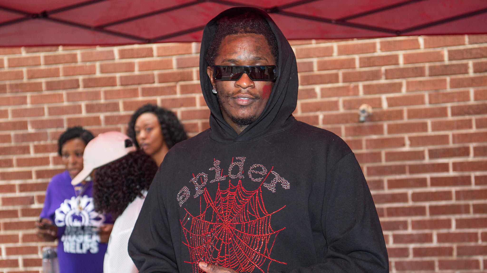 Young Thug attends a Back-to-School Event at Hosea Helps.