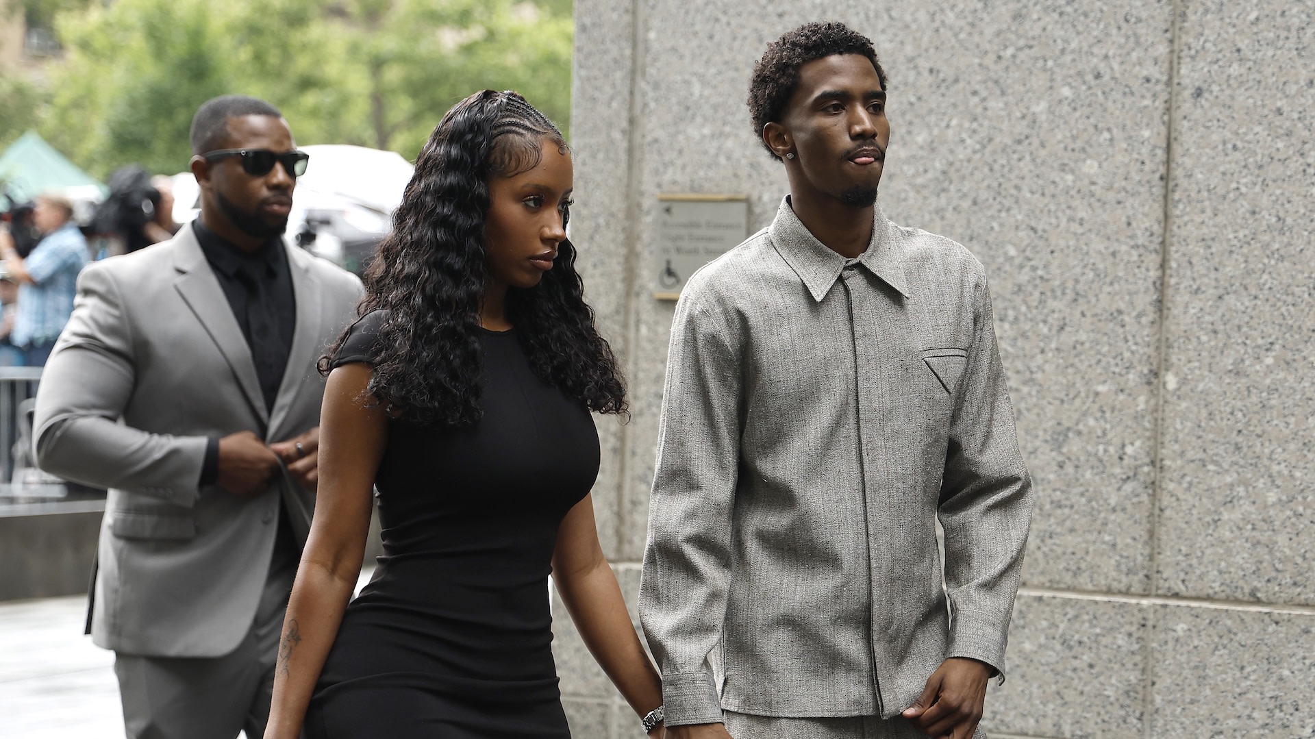 NEW YORK, NEW YORK - JULY 02: Raven Tracy and King Combs arrive at the Sean Combs' sex trafficking and racketeering trial at Manhattan Federal Court on July 2, 2025 in New York City. The jury continues deliberation on the final verdict of racketeering conspiracy in Combs’ trial after reaching a verdict yesterday on the four other counts, two each of sex trafficking and transportation to engage in prostitution. Combs faces a sentence that could extend to life in prison if convicted and has pleaded not guilty. 