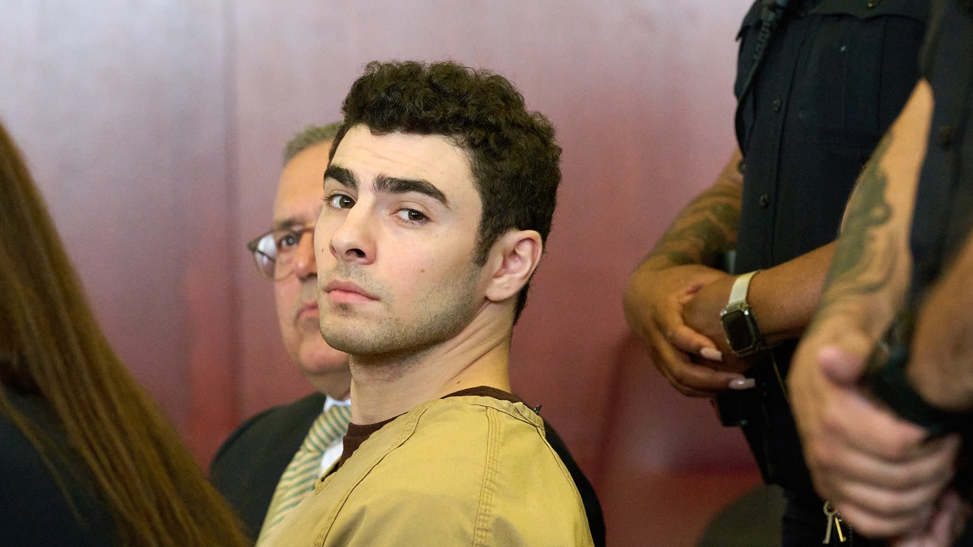 NEW YORK, NEW YORK - SEPTEMBER 16: Luigi Mangione appears in court for a hearing on his state murder charges in the killing of UnitedHealthcare CEO Brian Thompson in Manhattan Supreme Court on September 16, 2025 in New York City. Mangione is accused of murdering UnitedHealthcare CEO Brian Thompson late last year. He is facing 11 counts for the December 4th shooting outside a midtown Manhattan hotel, which set off a massive manhunt. He is also facing federal charges of murder and other charges in Pennsylvania, where he was arrested.