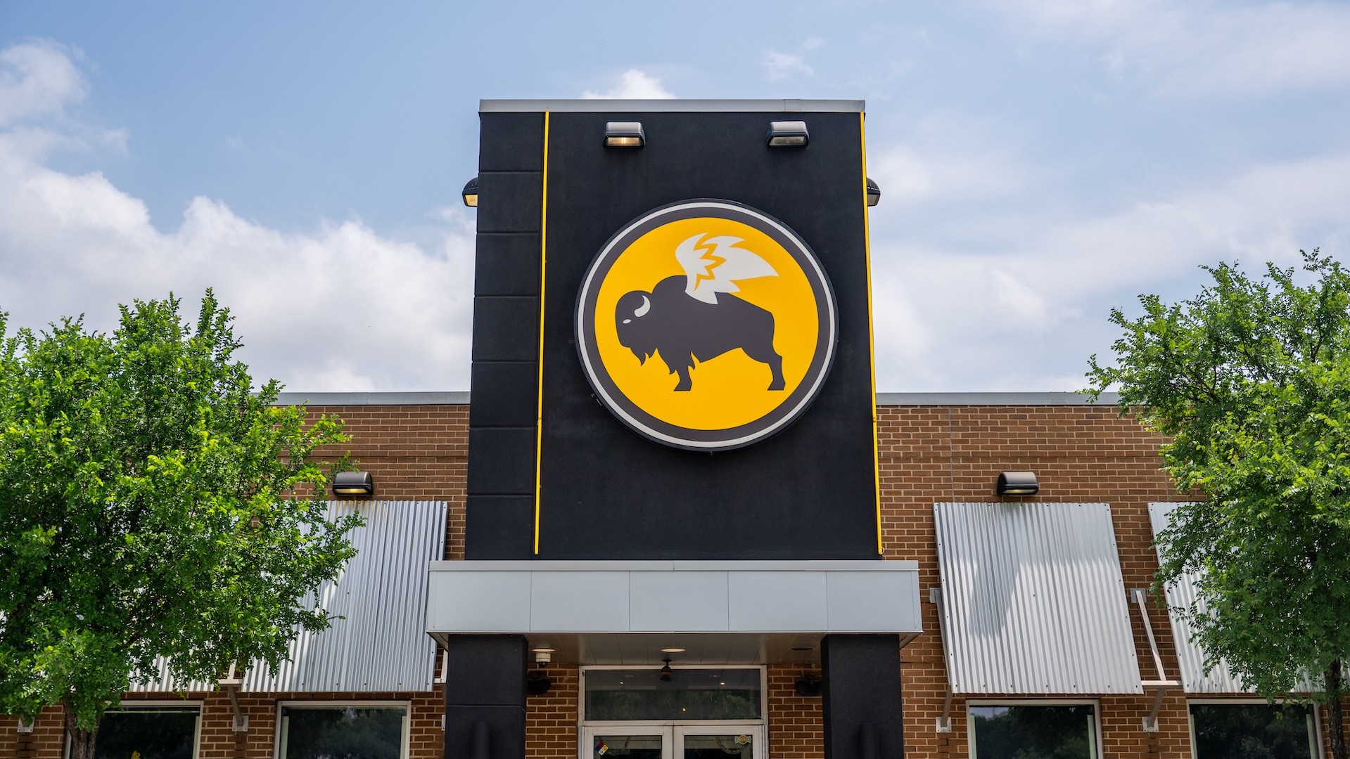 The exterior of a Buffalo Wild Wings casual dining restaurant.