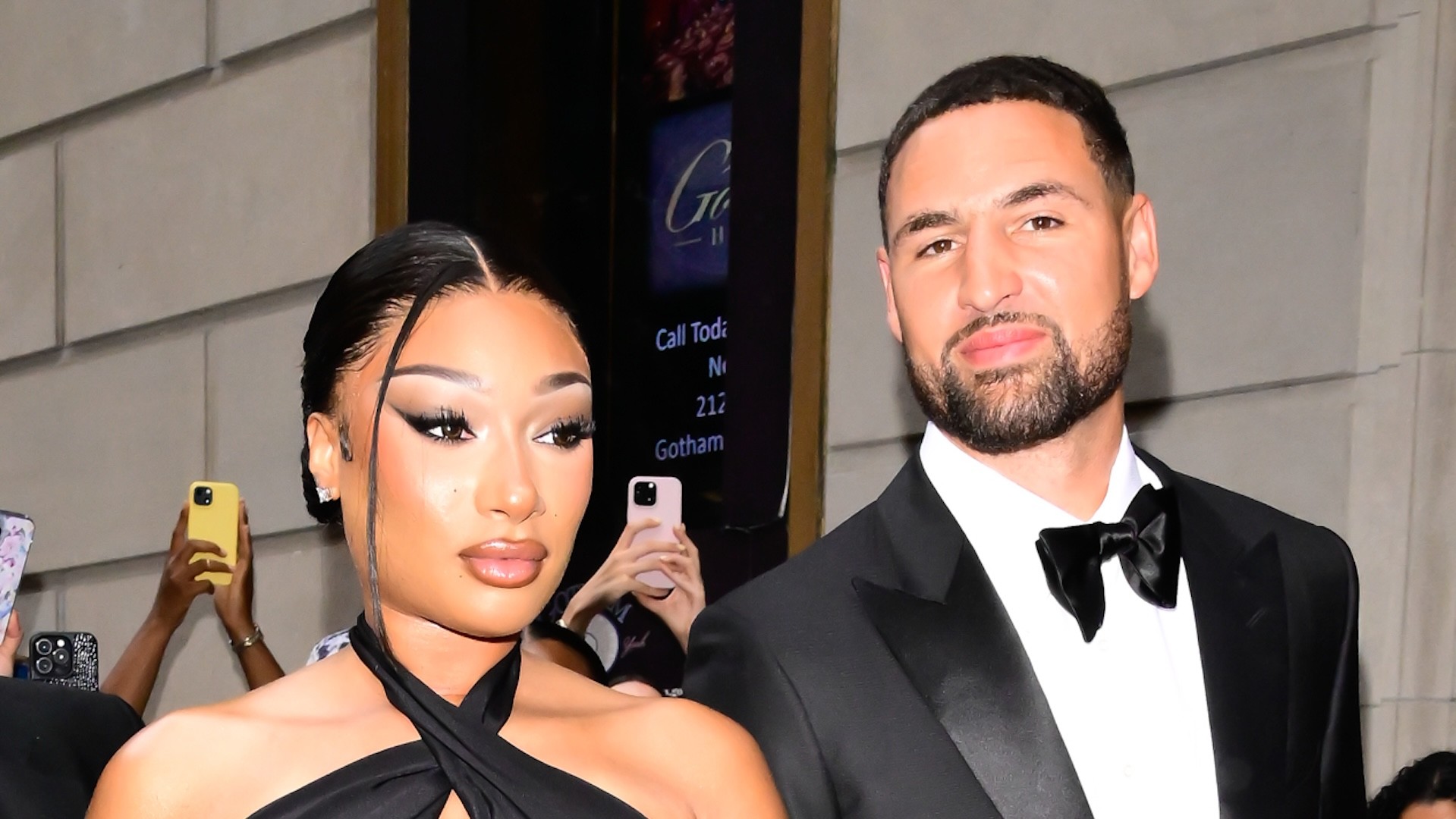 Megan Thee Stallion and Klay Thompson pose for photo together.