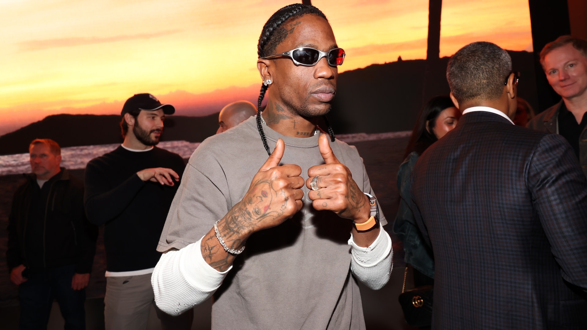 Travis Scott Broke a Sign During a Performance at a Super Bowl LX Party