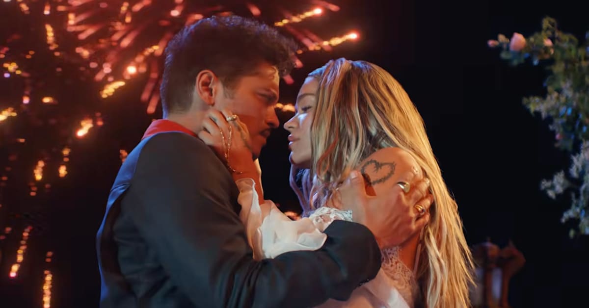 Bruno Mars Serenades Karol G in Love-Filled 'Dance With Me' Music Video