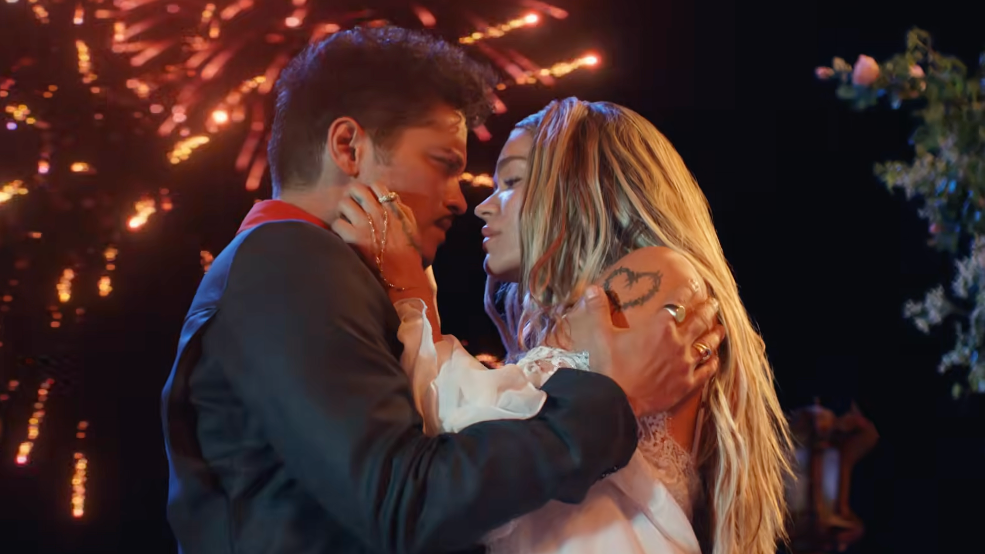 (L-R) Bruno Mars and Karol G.