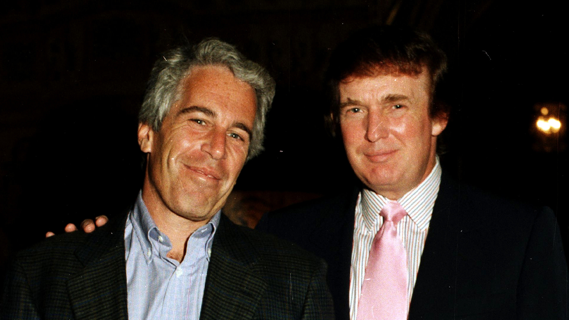 Portrait of American financier Jeffrey Epstein (left) and real estate developer Donald Trump as they pose together at the Mar-a-Lago estate, Palm Beach, Florida, 1997.