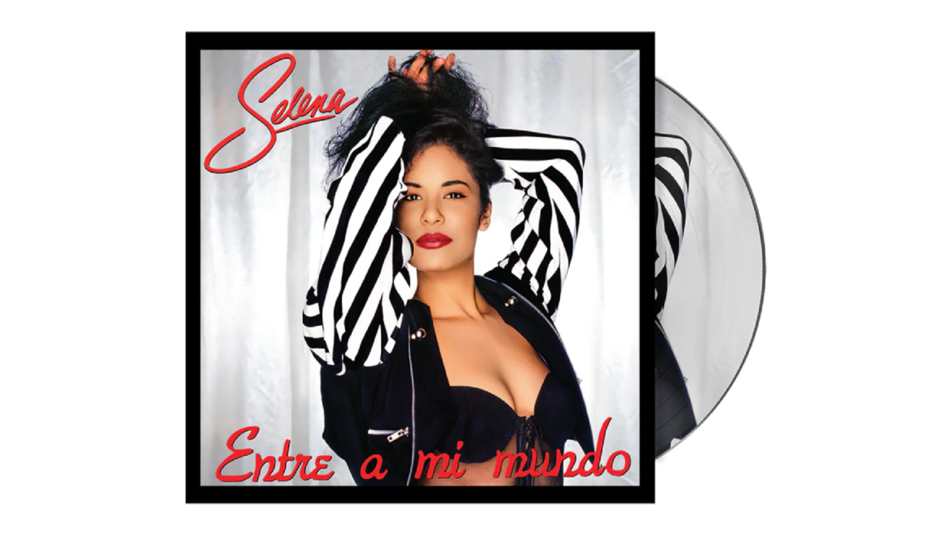 Album cover of "Entre a Mi Mundo" by Selena, featuring her in a black and white striped jacket with red lipstick.