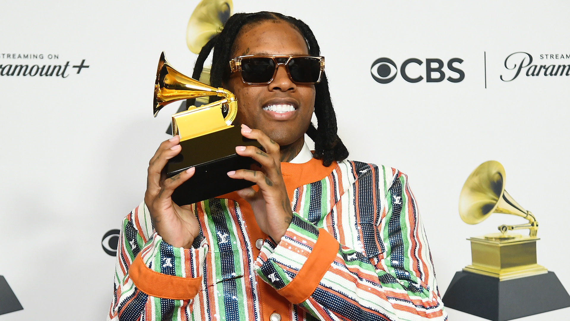 Lil Durk poses with his Best Melodic Rap Performance Grammy at the 66th Grammy Awards in 2024.