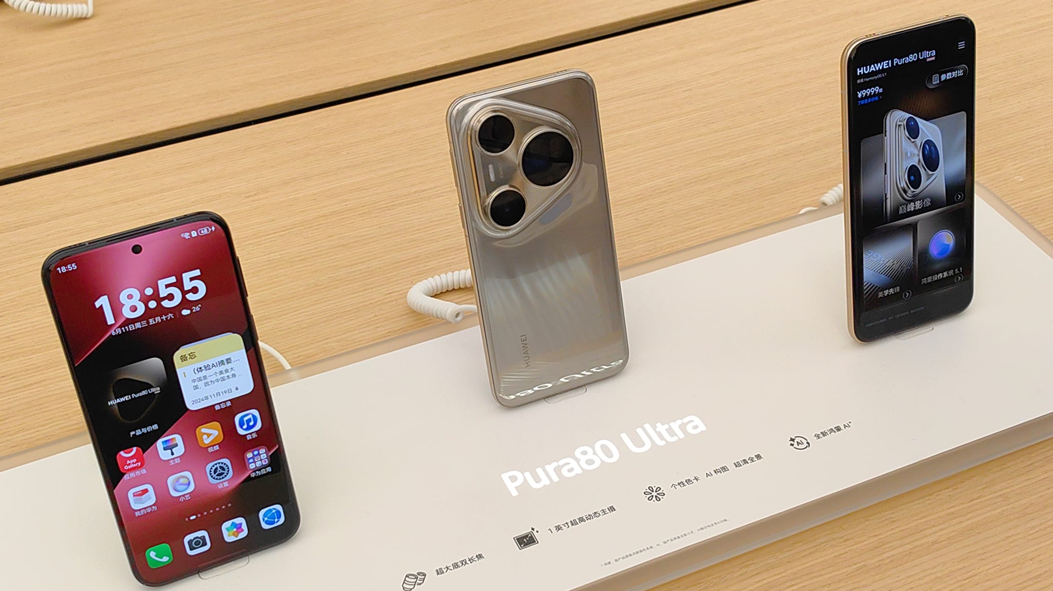 Three Huawei Pura80 Ultra smartphones on display, two showing the screen and one showing the back with triple cameras.