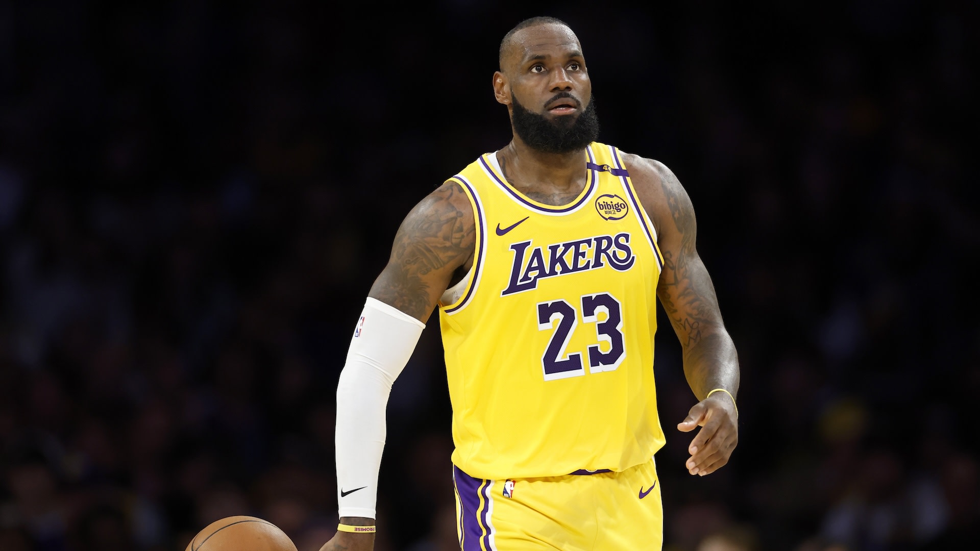 LOS ANGELES, CALIFORNIA - APRIL 30: LeBron James #23 of the Los Angeles Lakers tosses the ball back during a 103-96 loss to the Minnesota Timberwolves in Game Five of the Western Conference First Round NBA Playoffs at Crypto.com Arena on April 30, 2025 in Los Angeles, California.