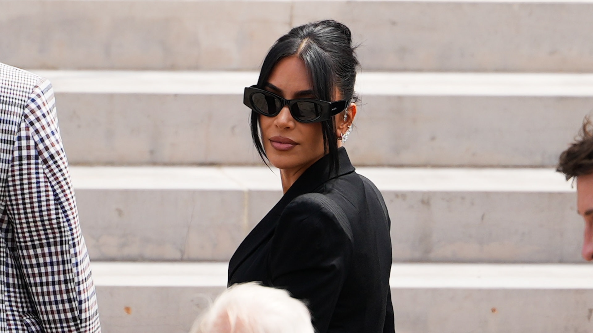 PARIS, FRANCE - MAY 13: Kim Kardashian arrives at the Palais de Justice, wearing Alaia sunglasses, on May 13, 2025 in Paris, France.