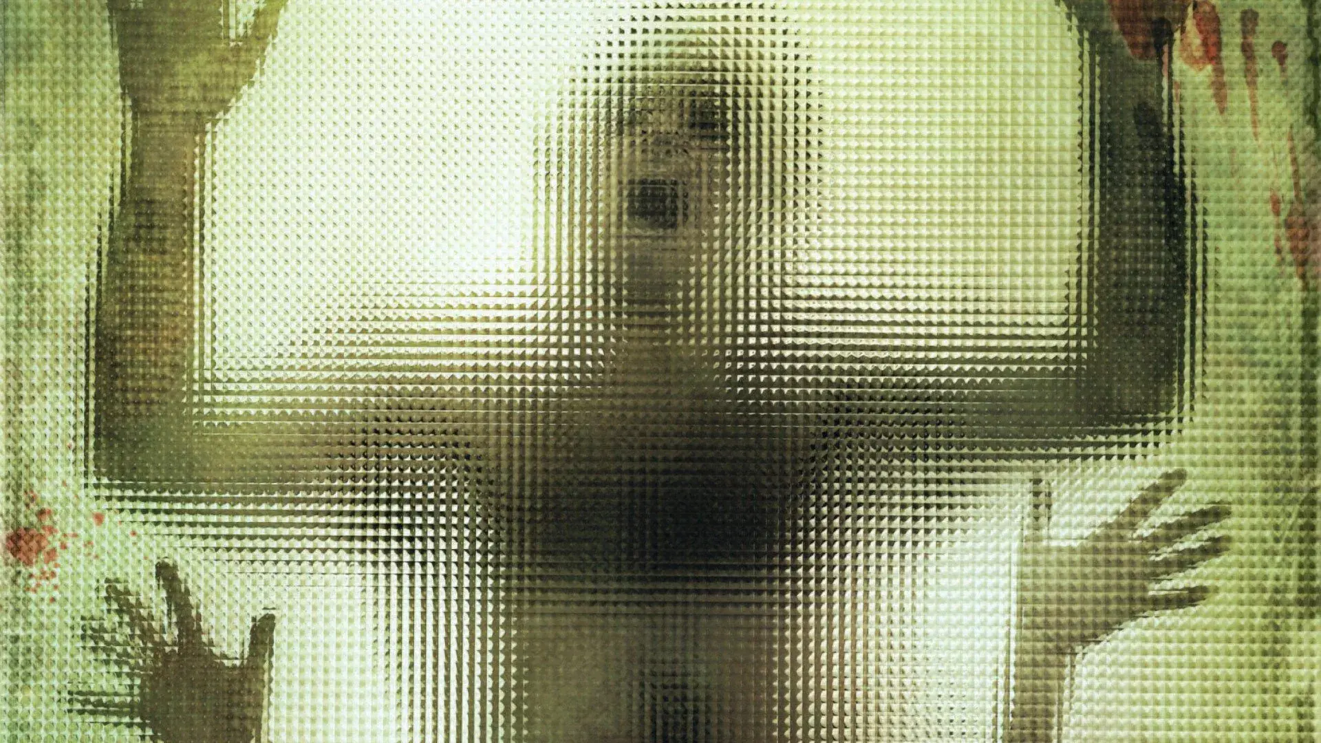 A blurred figure with outstretched hands behind textured glass, creating a dramatic and eerie effect.