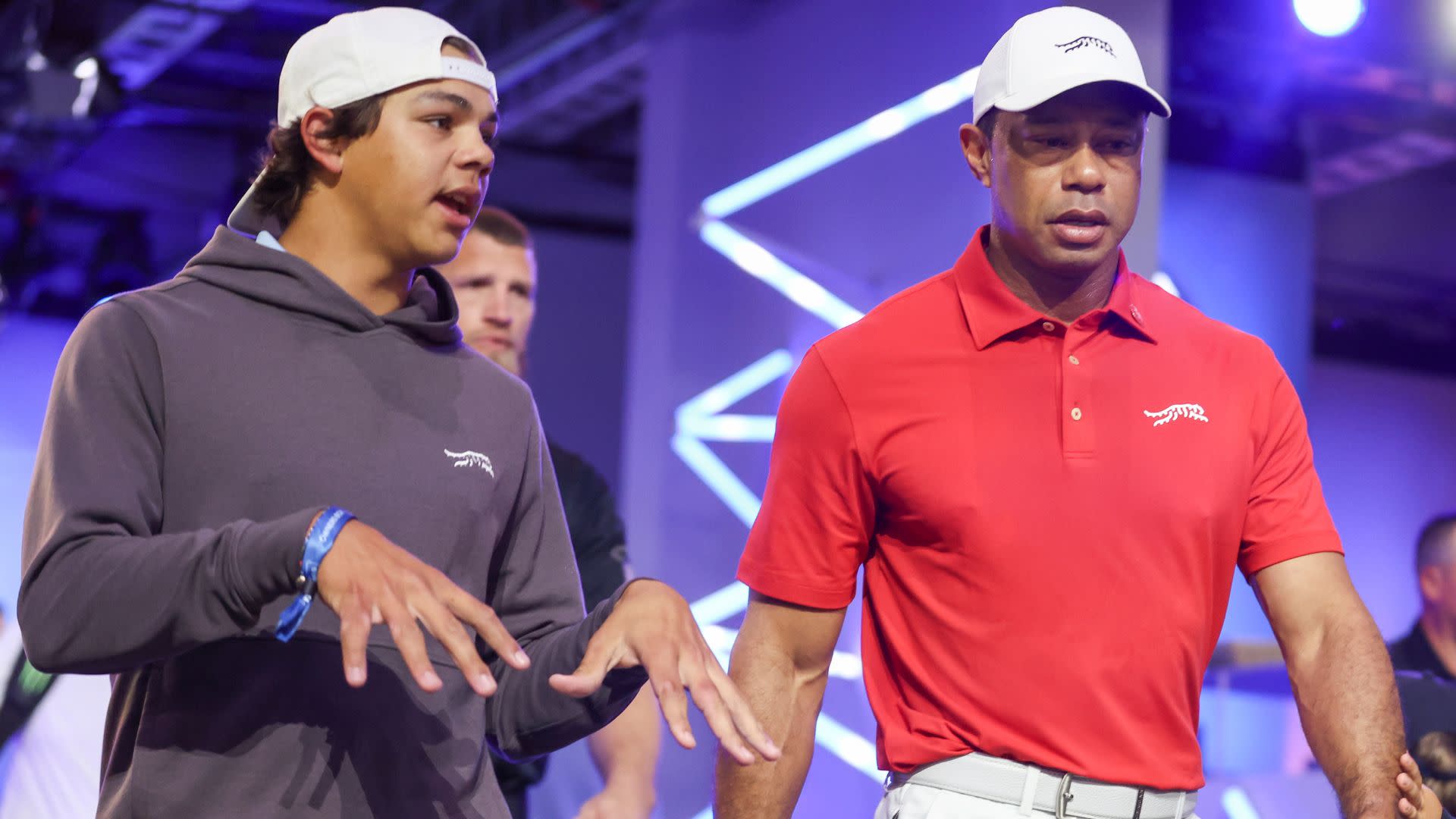 Charlie Woods and Tiger Woods.