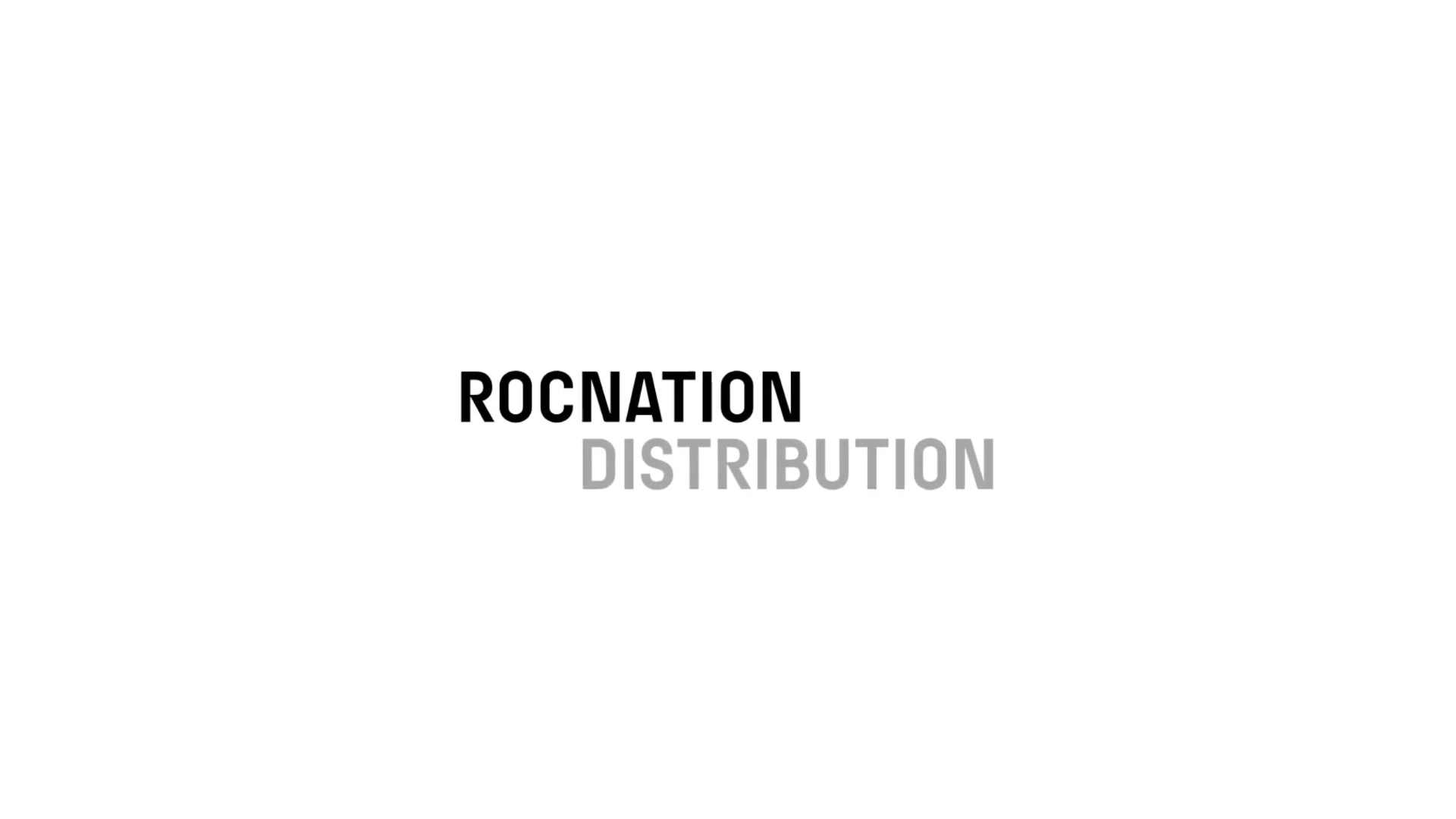 Text "ROCNATION DISTRIBUTION" on a white background. "ROCNATION" is in bold black, and "DISTRIBUTION" is in lighter gray.