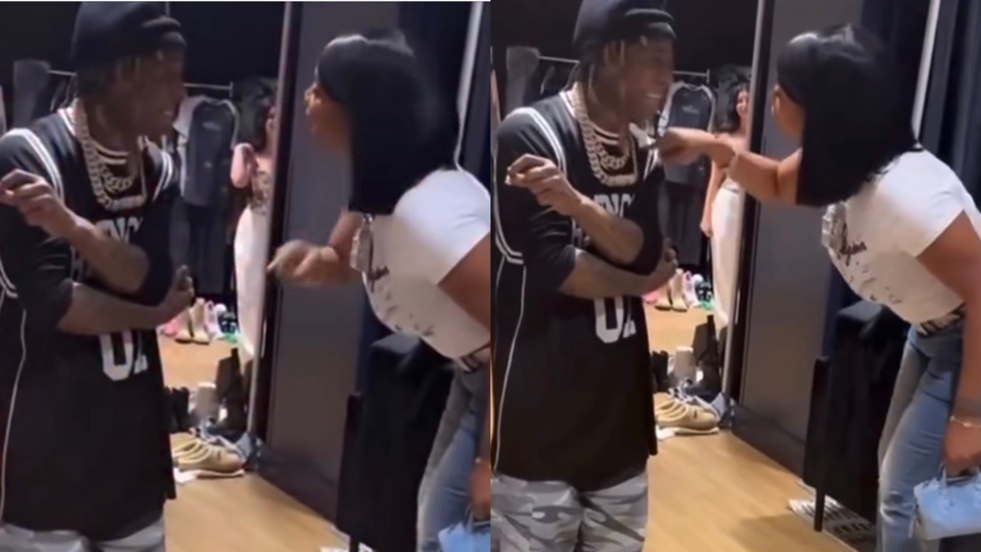 A person in a black jersey and cap is talking to another person in a white t-shirt and jeans, gesturing animatedly in a room.