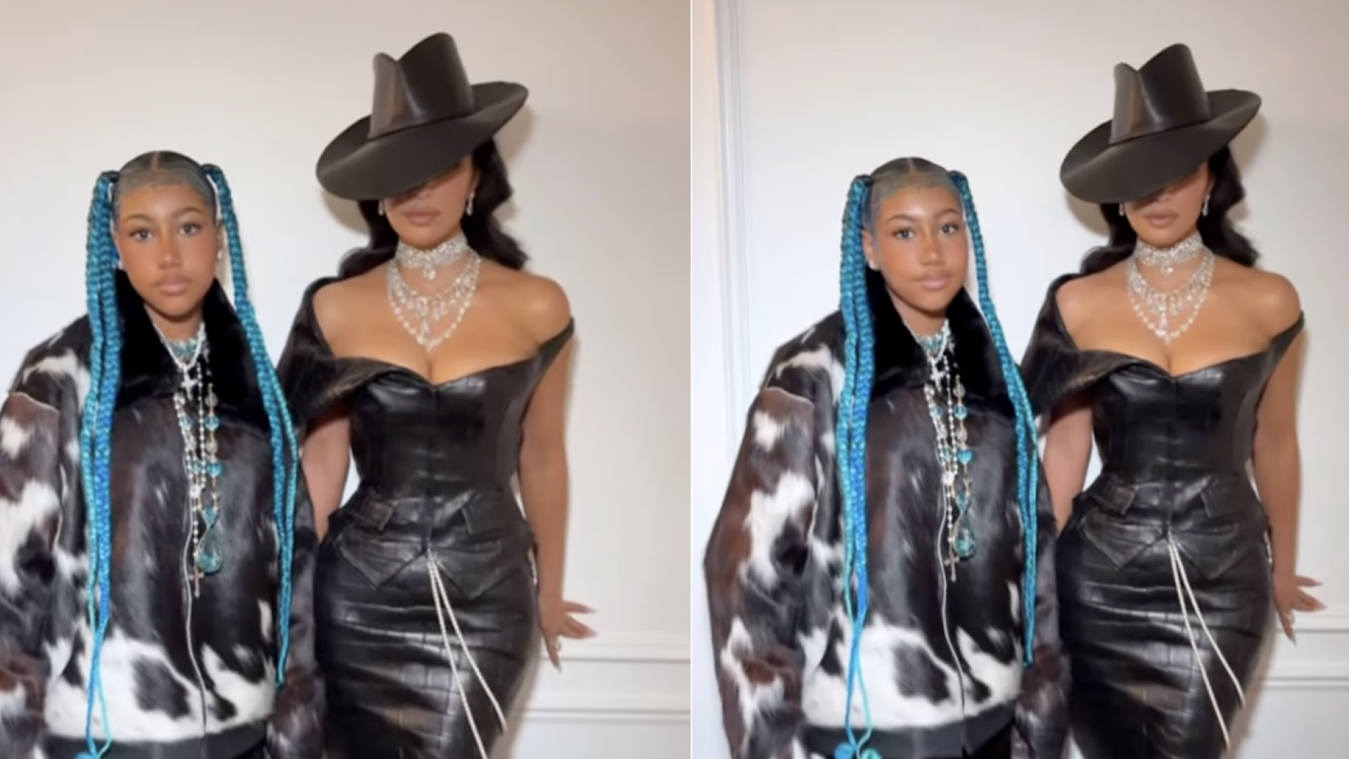 Kim Kardashian in a black leather dress and wide-brimmed hat stands beside North West with blue braids and a black-and-white jacket.