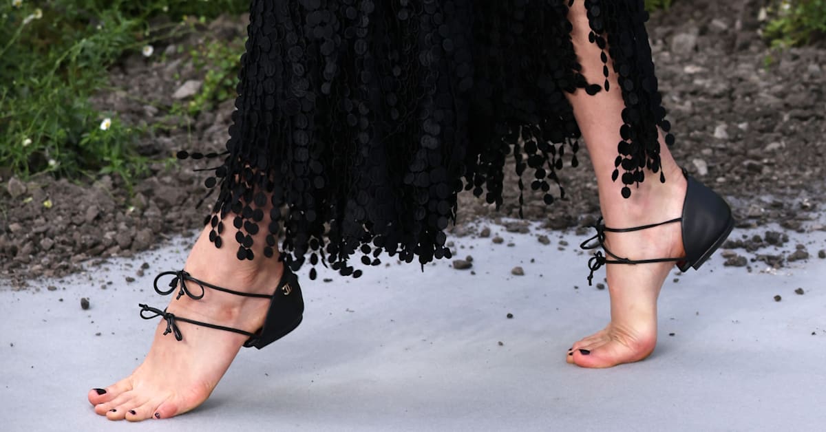 Margaret Qualley Debuts Chanel’s Barefoot Heel-Cap Shoes in London
