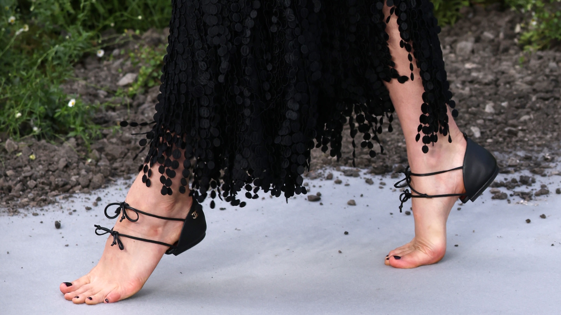 Margaret Qualley in Chanel's Barefoot Heel-Cap shoes.