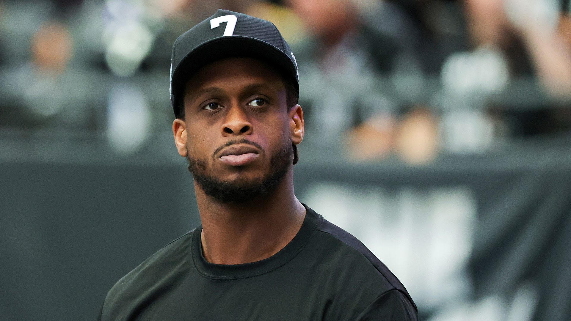 Geno Smith #7 of the Las Vegas Raiders walks on the field after halftime of a game against the Kansas City Chiefs at Allegiant Stadium on January 04, 2026 in Las Vegas, Nevada.