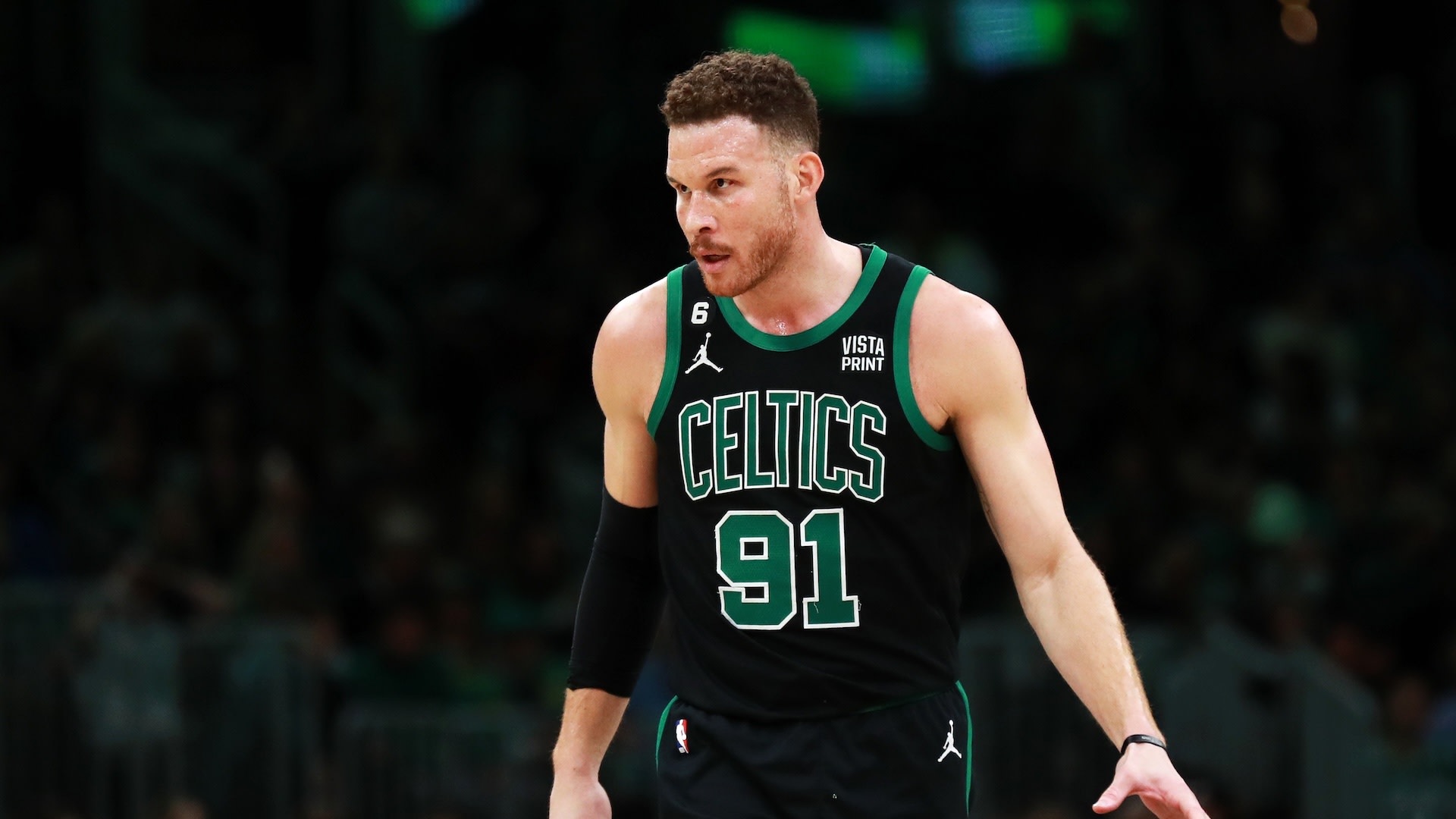 BOSTON, MASSACHUSETTS - APRIL 07: Blake Griffin #91 of the Boston Celtics brings the ball up court during the fourth quarter of the game against the Toronto Raptors at TD Garden on April 07, 2023 in Boston, Massachusetts. 