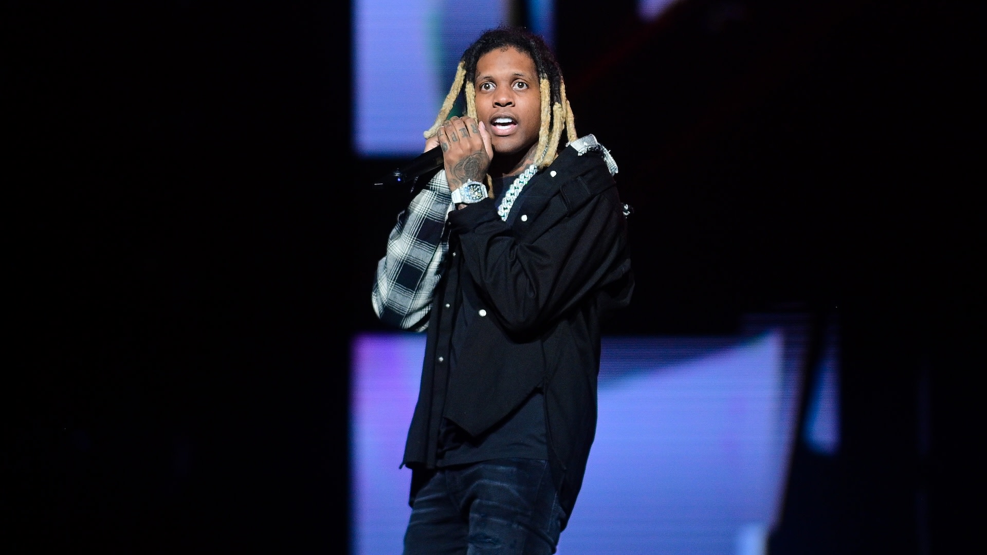 
CHARLOTTE, NORTH CAROLINA - JANUARY 13: Rapper Lil Durk performs during Future & Friends "One Big Party Tour"at Spectrum Center on January 13, 2023 in Charlotte, North Carolina.