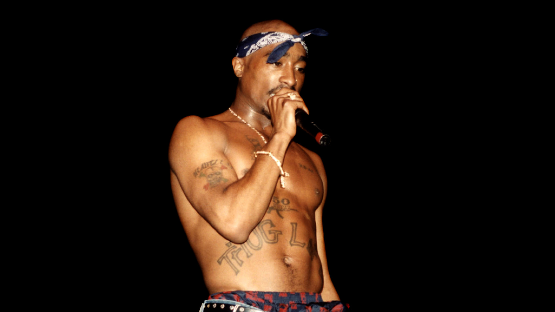 Rapper Tupac Shakur performs at the Regal Theater in Chicago, Illinois in March 1994. 
