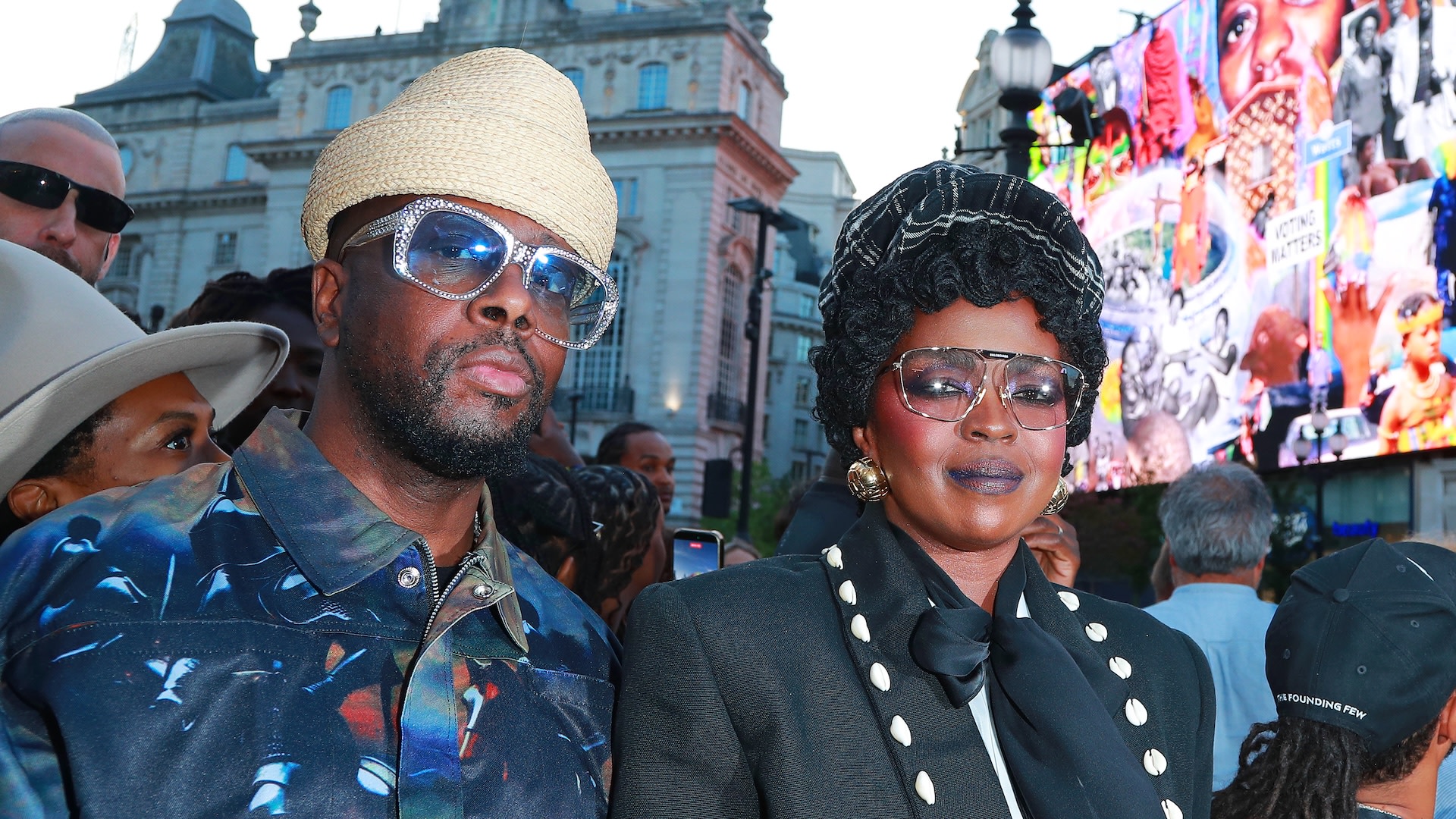 LONDON, ENGLAND - AUGUST 05: Wyclef Jean and Lauryn Hill attend the unveiling of artist Lauren Halsey's new CIRCA commission curated at Ms. Lauryn Hill at Piccadilly Lights on August 5, 2026 in London, England.