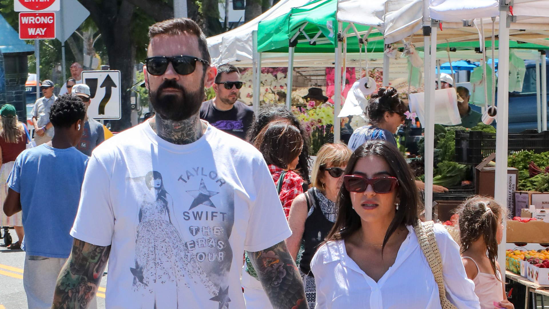 Adam22 and Lena the Plug are seen at the farmer's market on July 05, 2026 in Los Angeles, California.